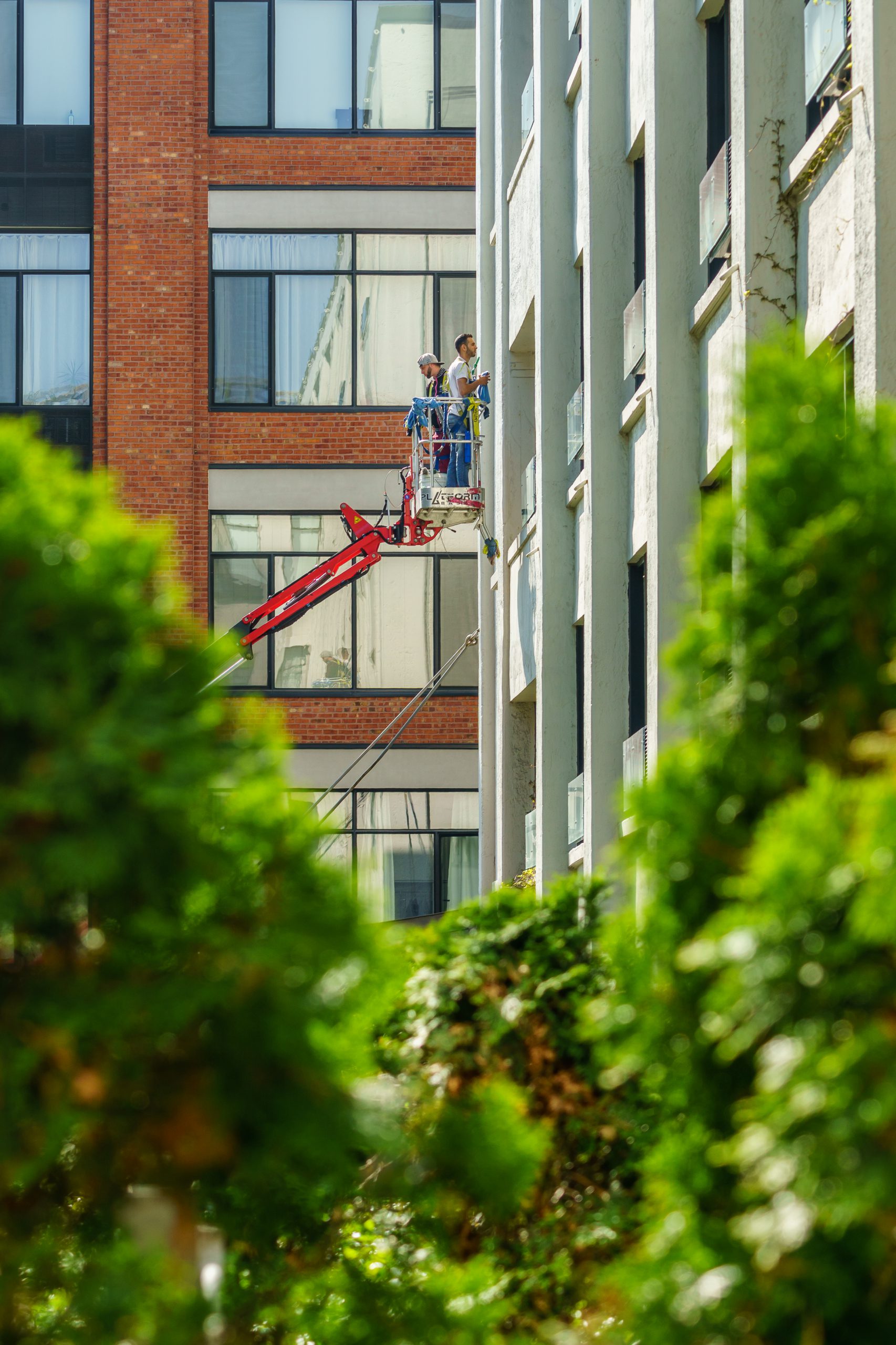 Lavage de vitres en hauteur Montréal | Groupe Impec